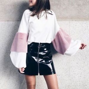 White oversized sweatshirt.